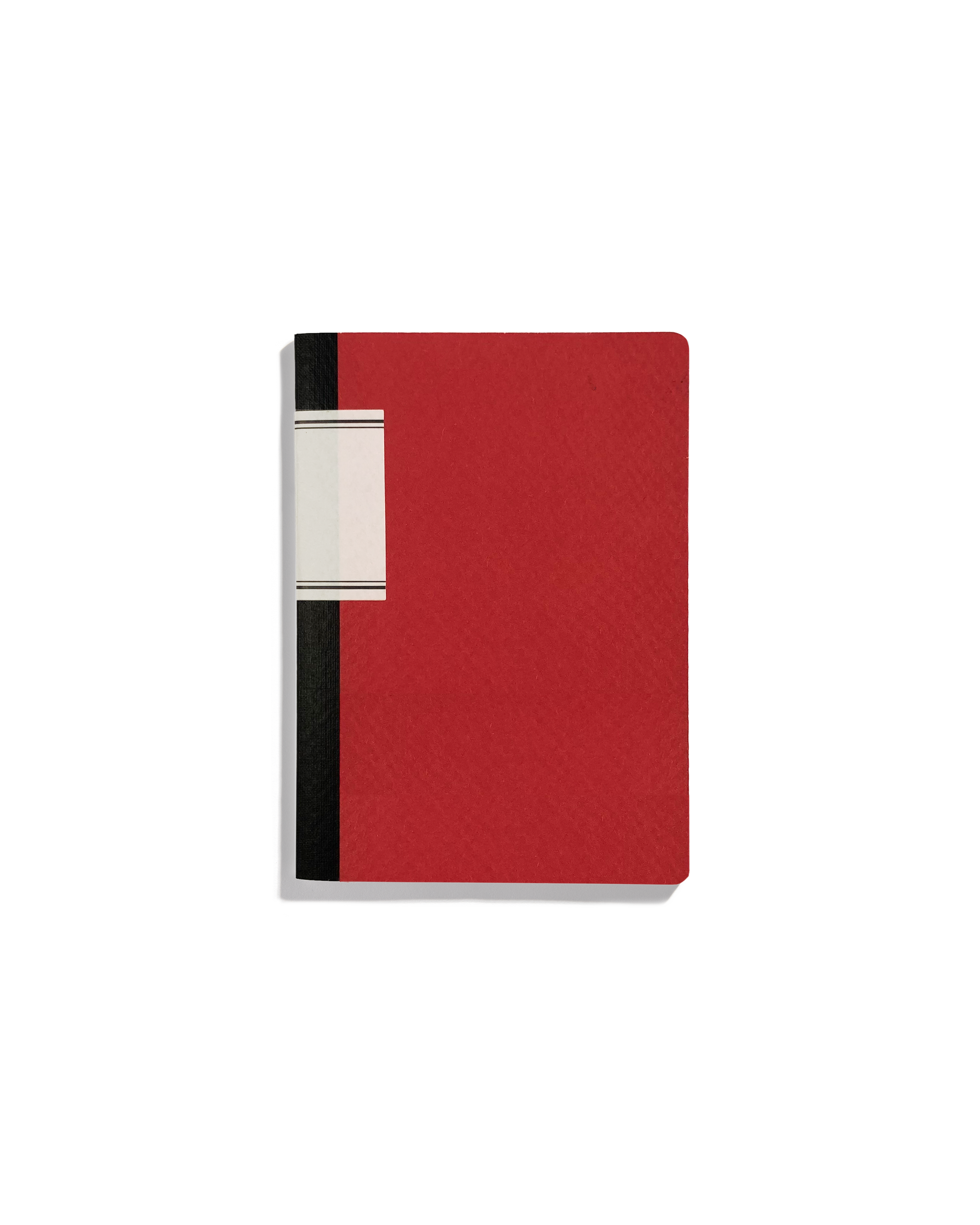 Rød pocket notesbog med linjeret side til notater, fra Thomas Merlo & Partner