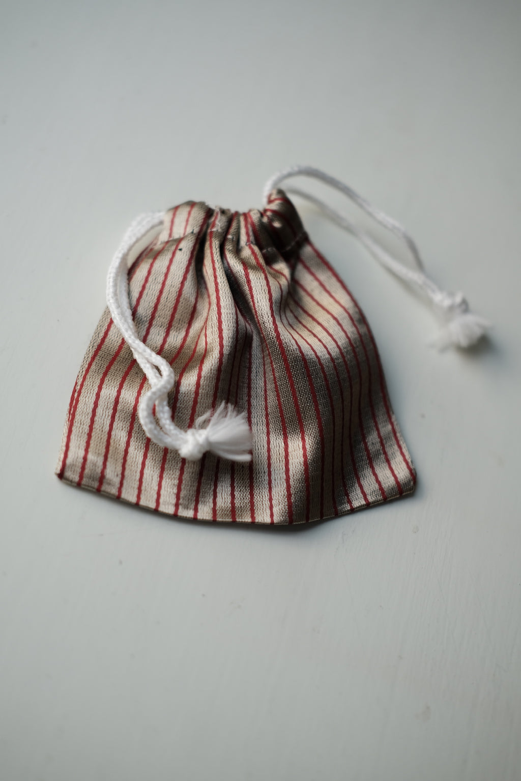 Small drawstring pouch • Stripes • 11 × 10 cm