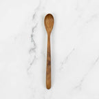 Redskab Marmeladeske made of teak wood by A World of Craft, showing a handcrafted wooden spoon with smooth finish and natural grain.