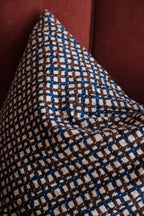 Blue and brown checkered cotton throw pillow from A World of Craft, 50x50 cm, with a cozy, textured fabric design.