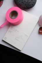 Midori B6 blank notesbook with soft cover and white pages, ideal for writing and note-taking.