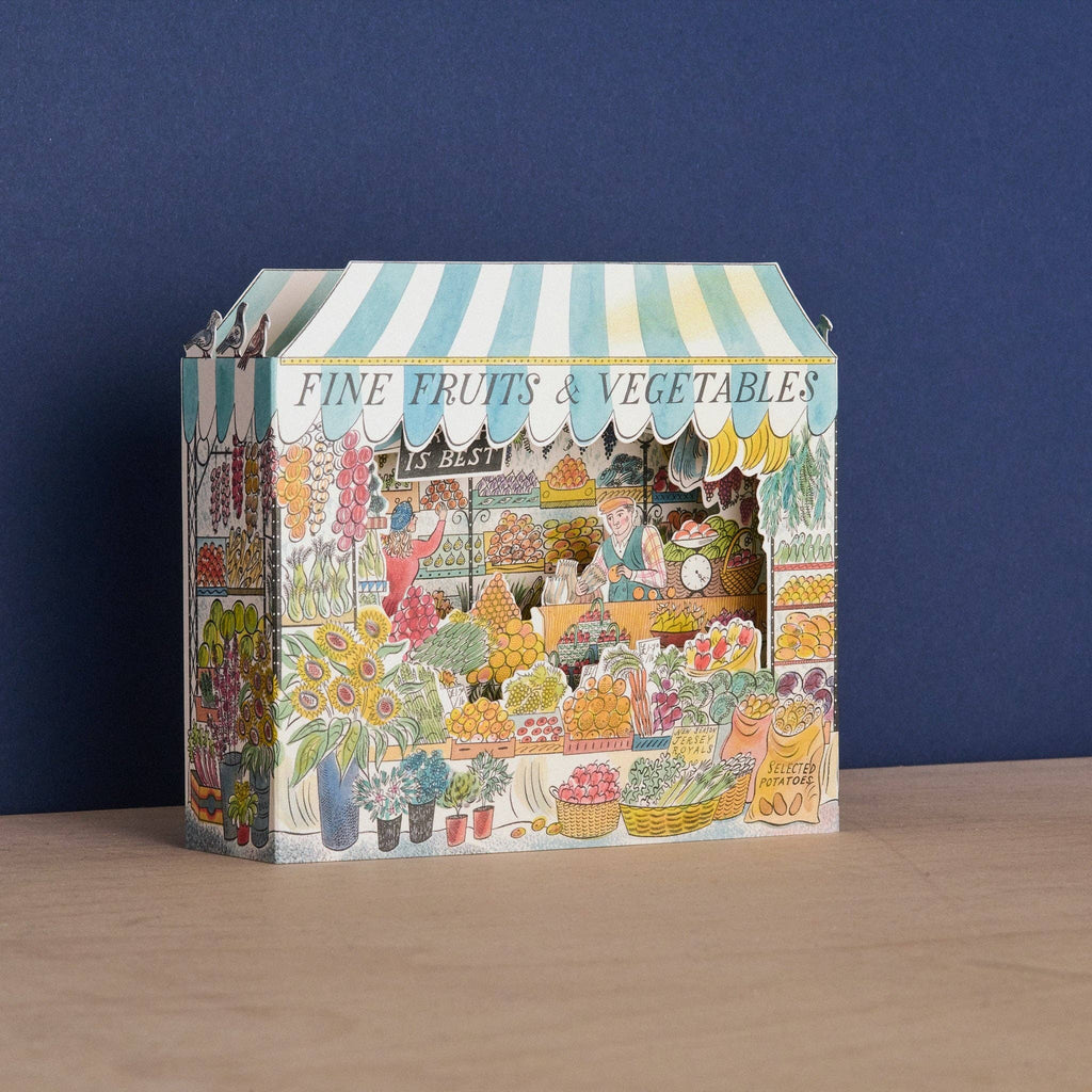 Art Angels Grønthandler kort featuring vibrant vegetable illustrations on a textured background.