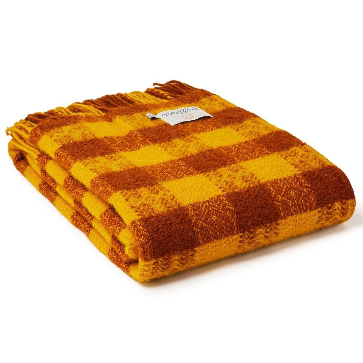 Tweedmill plaid blanket in orange and terracotta tweed, cozy wool throw with classic pattern for home decor.