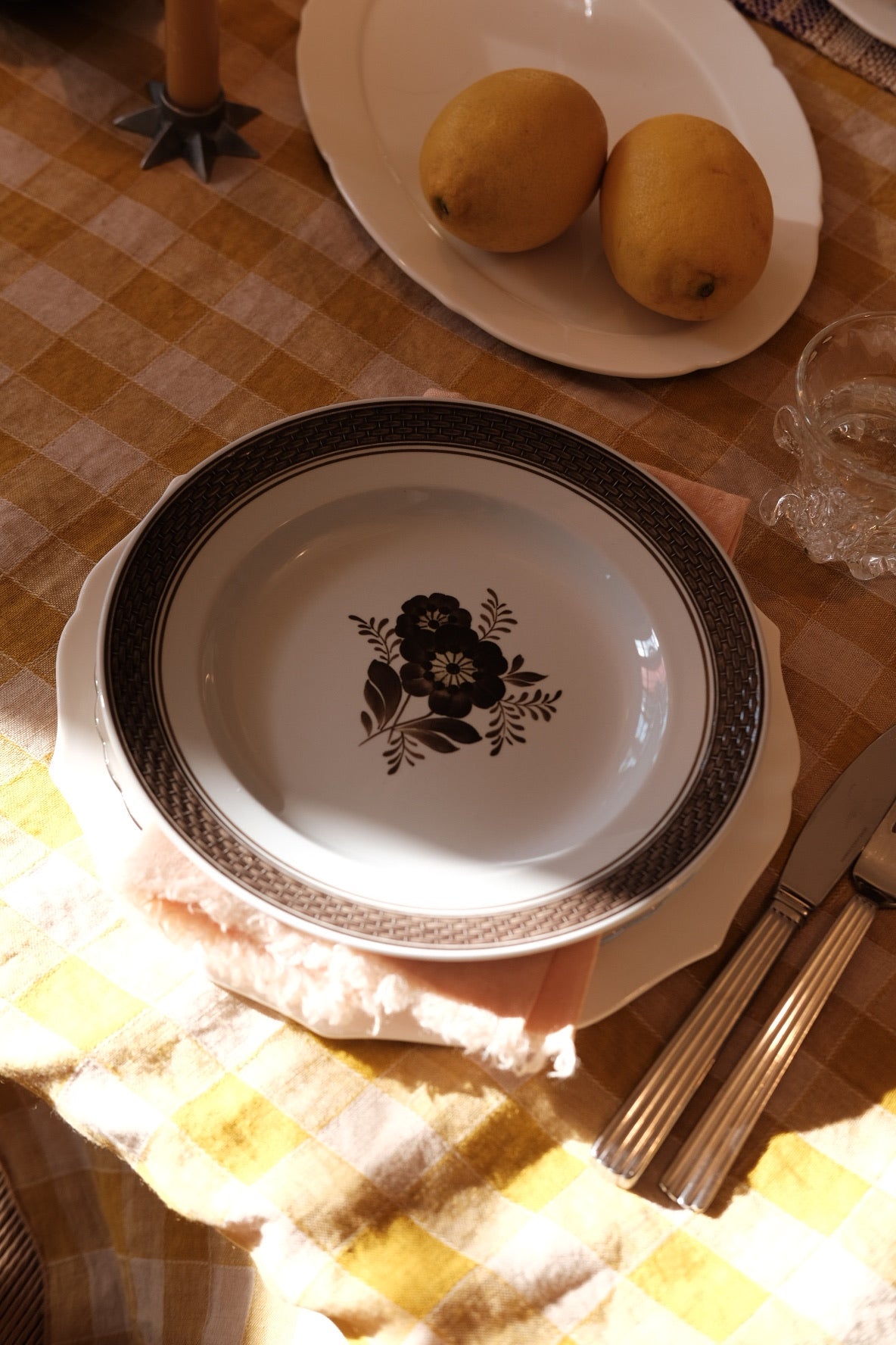 Vintage Royal Copenhagen 'Brun Morgenfrue' plate featuring intricate floral design and classic porcelain finish.