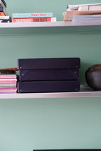 Dark purple ELVO DORA storage box for A4 documents, low-profile design with multiple compartments for organized storage.