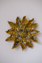 Handcrafted sunflower art object by Emilie Holm Atelier, featuring detailed, natural sunflower design for decorative purposes.