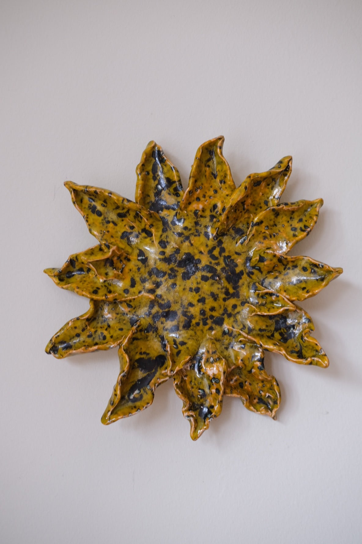 Handcrafted sunflower art object by Emilie Holm Atelier, featuring detailed, natural sunflower design for decorative purposes.