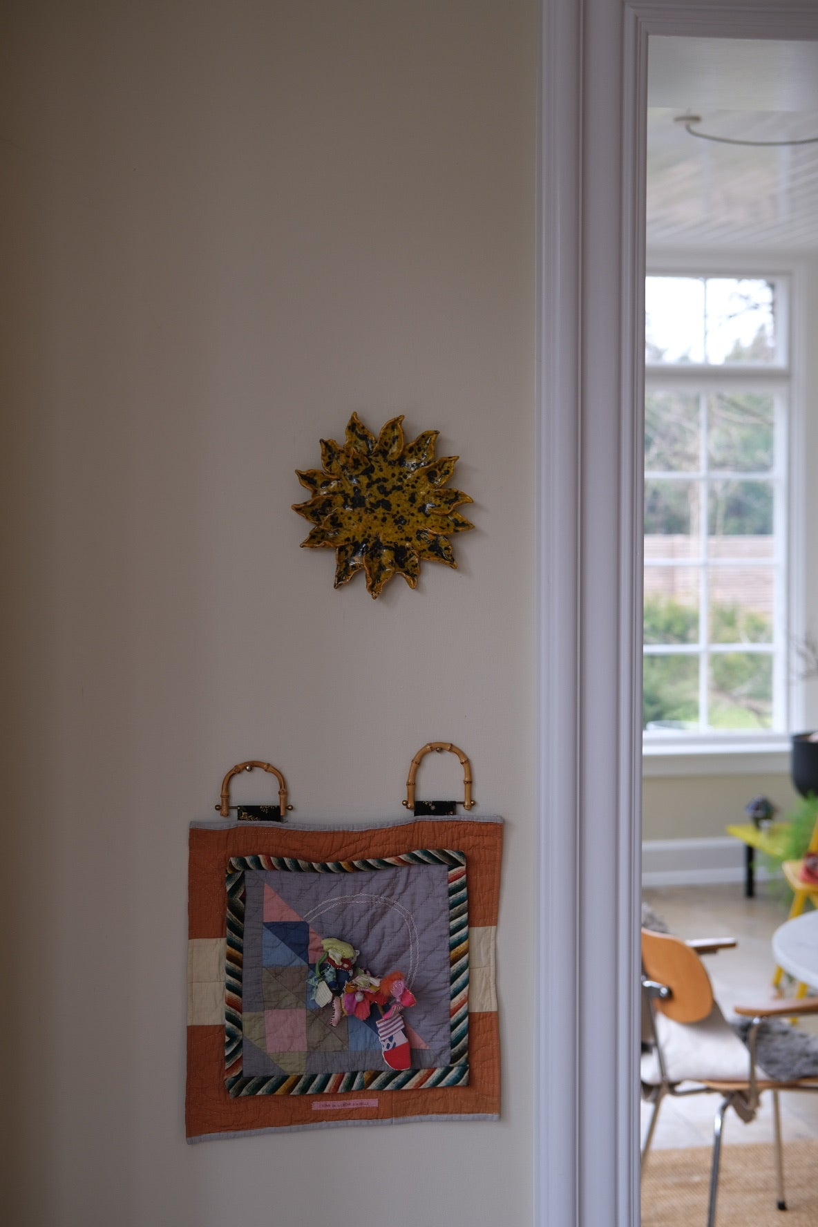 Handcrafted sunflower decorative object by Emilie Holm Atelier, featuring detailed yellow petals and a natural artistic design.