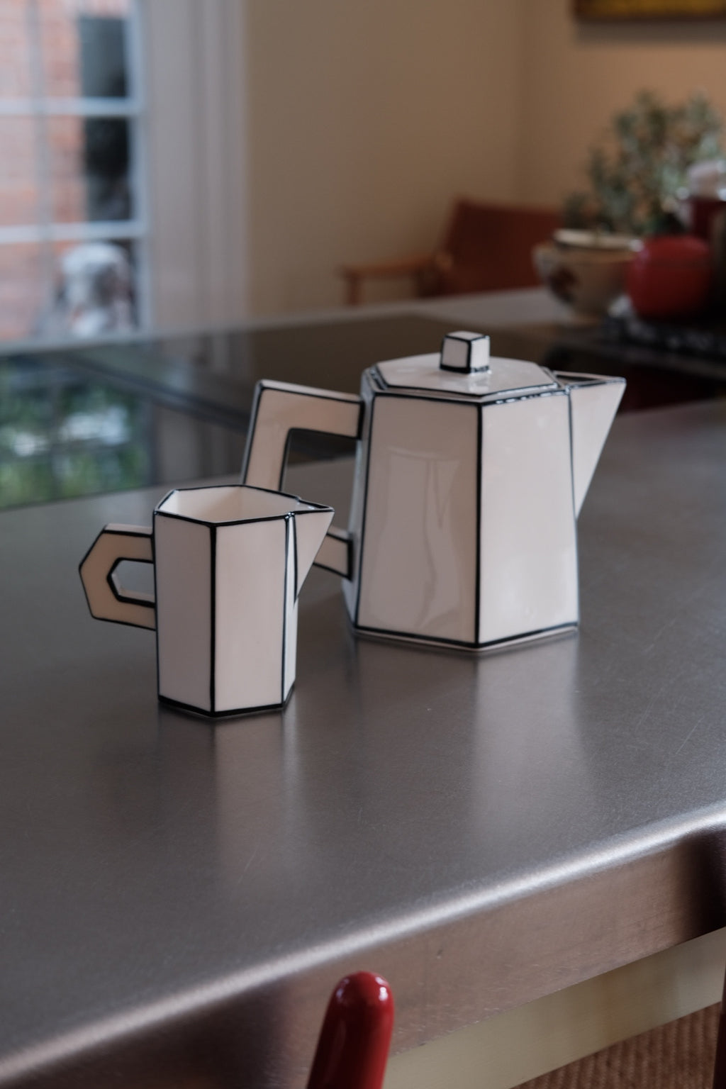 Serax Tekande fra Carte Blanche til te eller kaffe med elegant design, fremhævet i billedet.