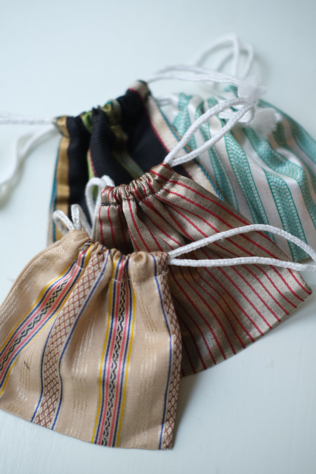 Small drawstring pouch • Stripes • 11 × 10 cm