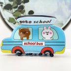 DORA hair clip used for medium hairstyle, with a school bus design, securing hair in a neat, stylish way.
