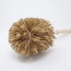 Iris Hantverk toilet brush with wooden handle and bristles, designed for bathroom cleaning and storage.