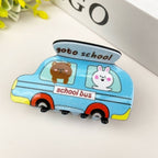 DORA medium hair clip securing hair in a school bus-themed hairstyle, suitable for school or casual wear.