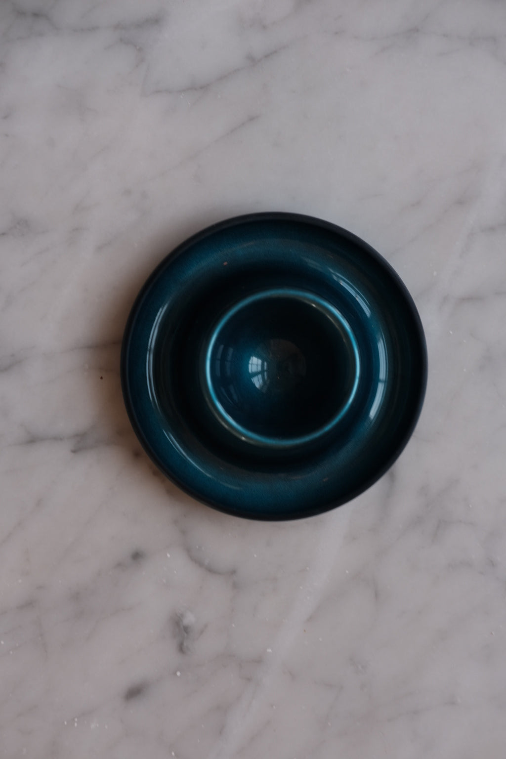 Heim Söhne petroleum egg cup, ceramic with a glossy finish, designed for holding boiled eggs in a classic style.