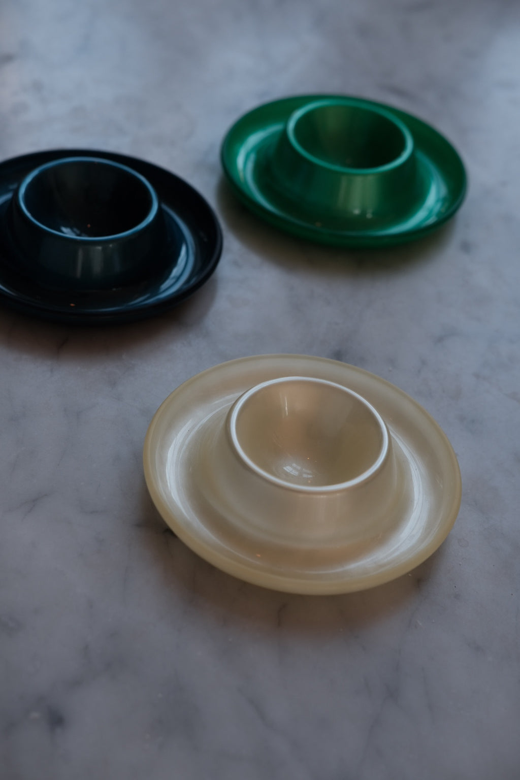 Cream-colored Heim Söhne egg cup featuring a smooth, elegant design perfect for serving boiled eggs.