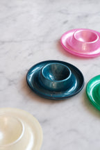 Petroleum-colored ceramic æggebæger by Heim Söhne, featuring a smooth, rounded design for holding eggs.