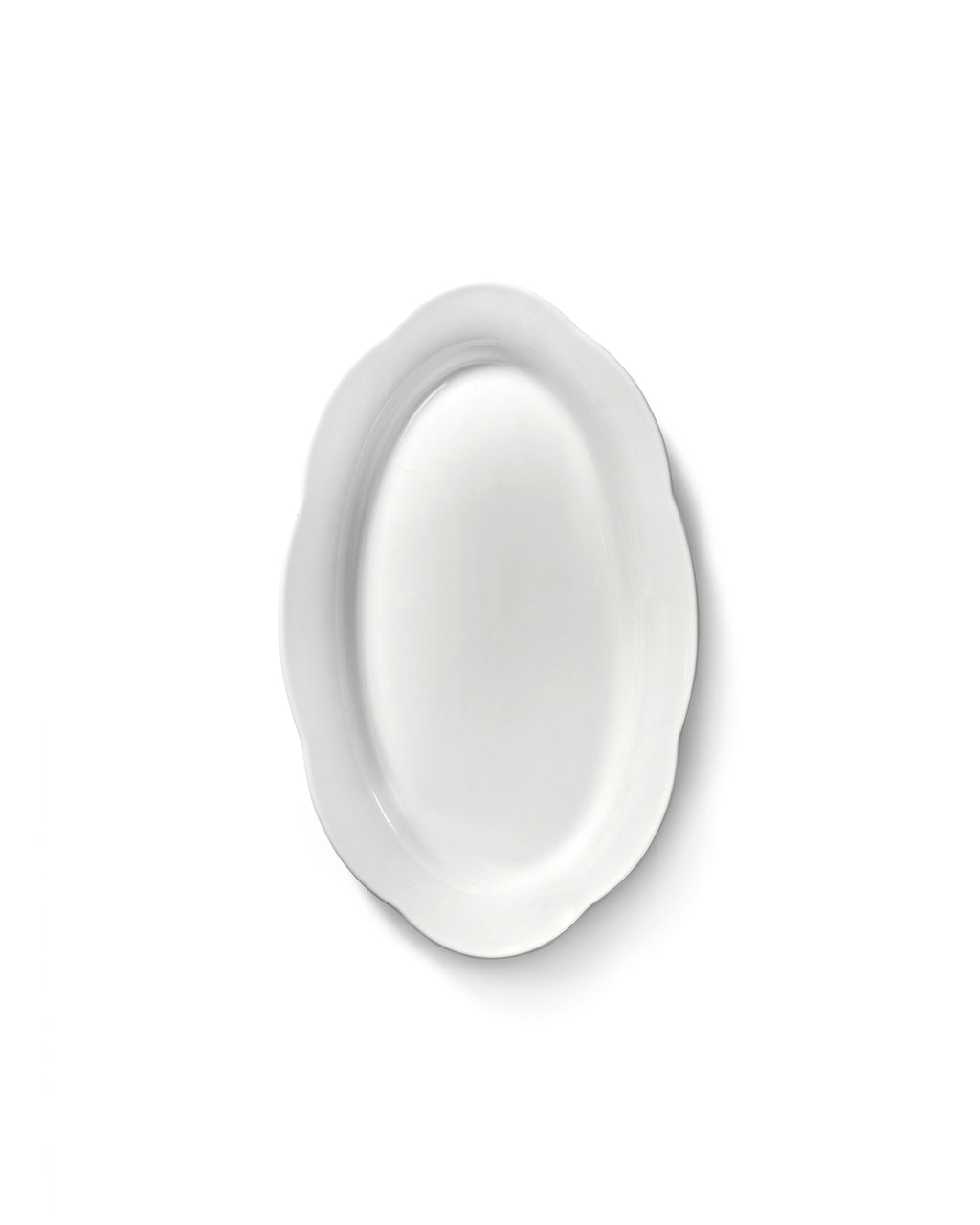 Dyb fad i silhouette-stil fra Serax, 24 cm, med elegant design og glat overflade, velegnet til dekoration eller servering.