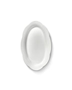 Dyb fad i silhouette-stil fra Serax, 24 cm, med elegant design og glat overflade, velegnet til dekoration eller servering.