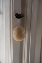 Handmade wool Easter egg decoration from Gamcha, featuring colorful, cozy felted design perfect for spring holiday decor.