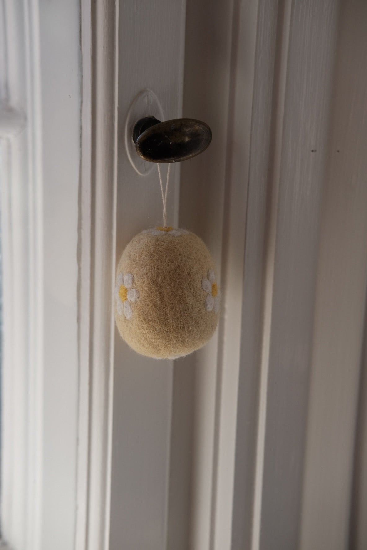 Handmade wool Easter egg decoration from Gamcha, featuring colorful, cozy felted design perfect for spring holiday decor.