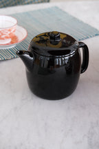 Tekande • Sort • DORA