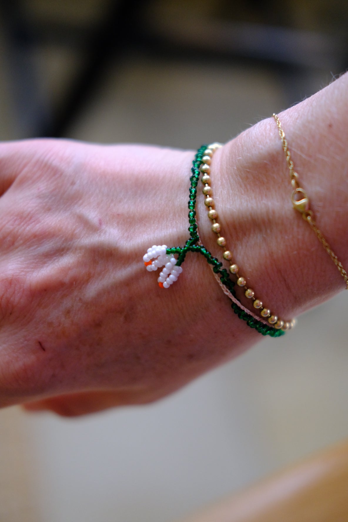 Armbånd • Kniplet • Grøn med hvid blomst