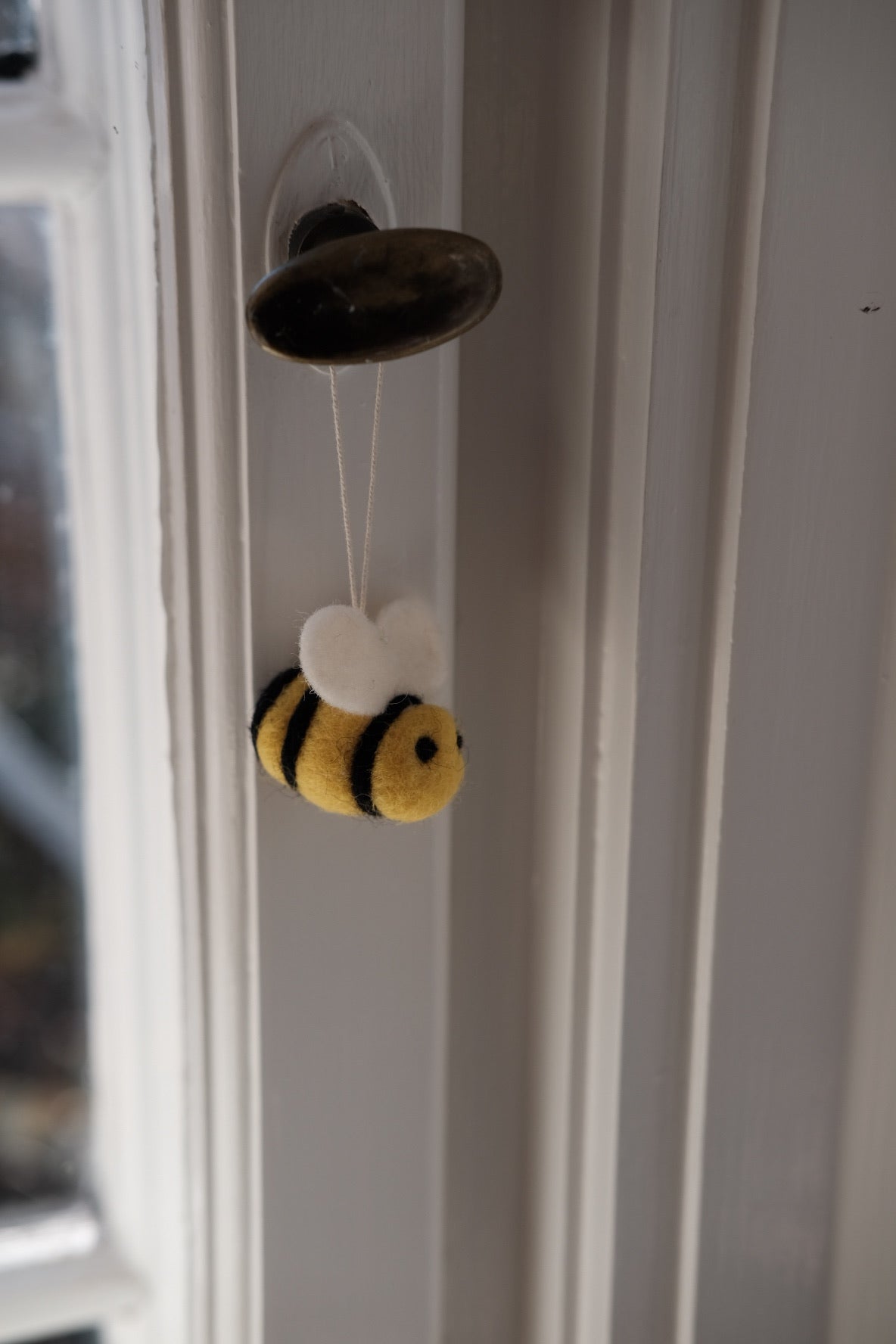 Gamcha Pynt Bi Uld Easter decoration featuring colorful woven textile with Easter-themed designs.