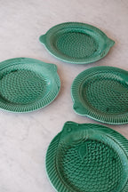 Vintage Fisk ceramic plate by DORA VINTAGE, Sarreguemines, with a green design featuring fish motifs.