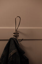 DORA KNAGER Lang Dobbeltkrog with chrome finish, wall-mounted hook for hanging items, close-up view of the double hook design.
