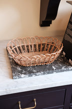 Large rattan bread basket by Bungalow, natural woven design ideal for serving or storing bread and baked goods.