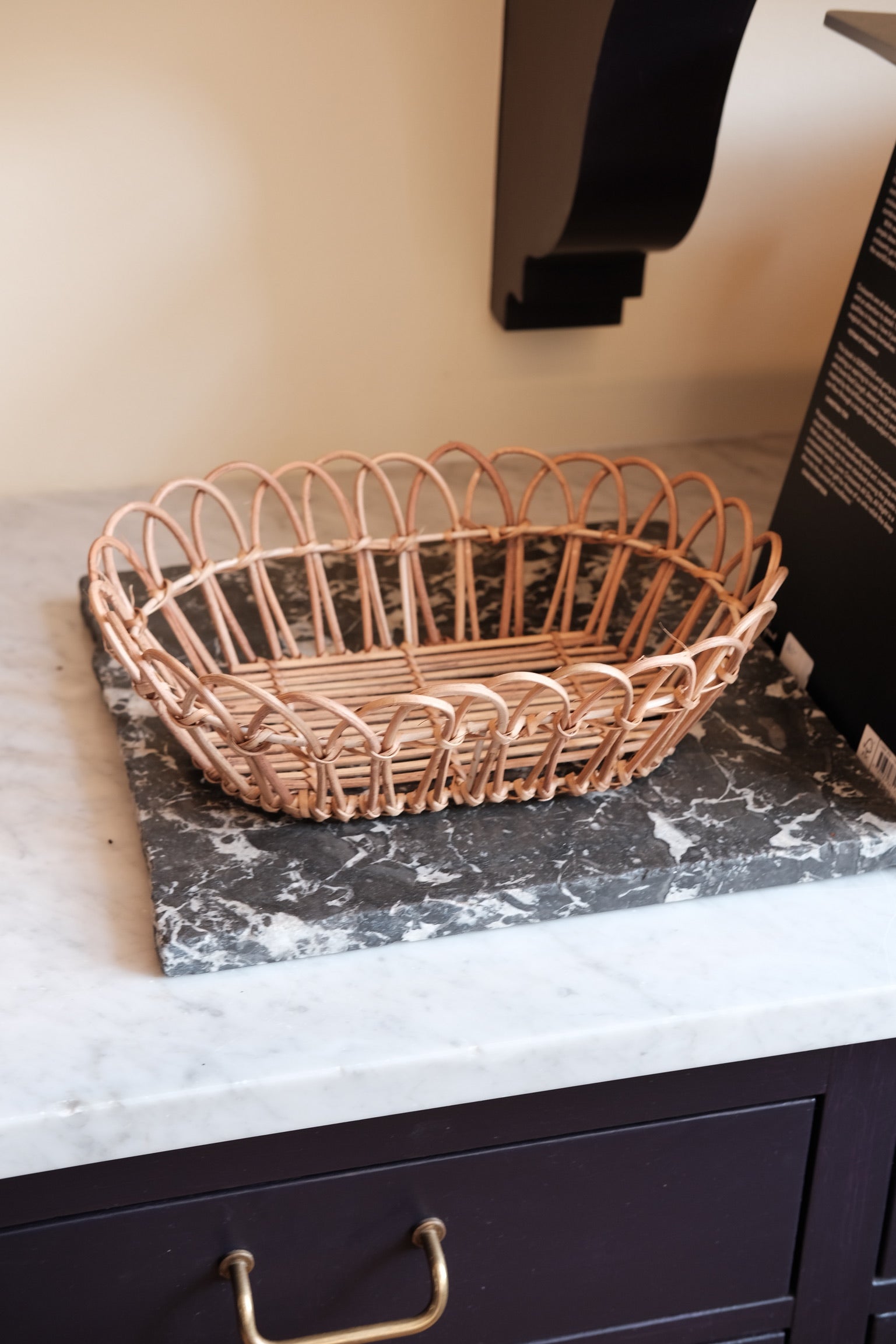 Large rattan bread basket by Bungalow, natural woven design ideal for serving or storing bread and baked goods.