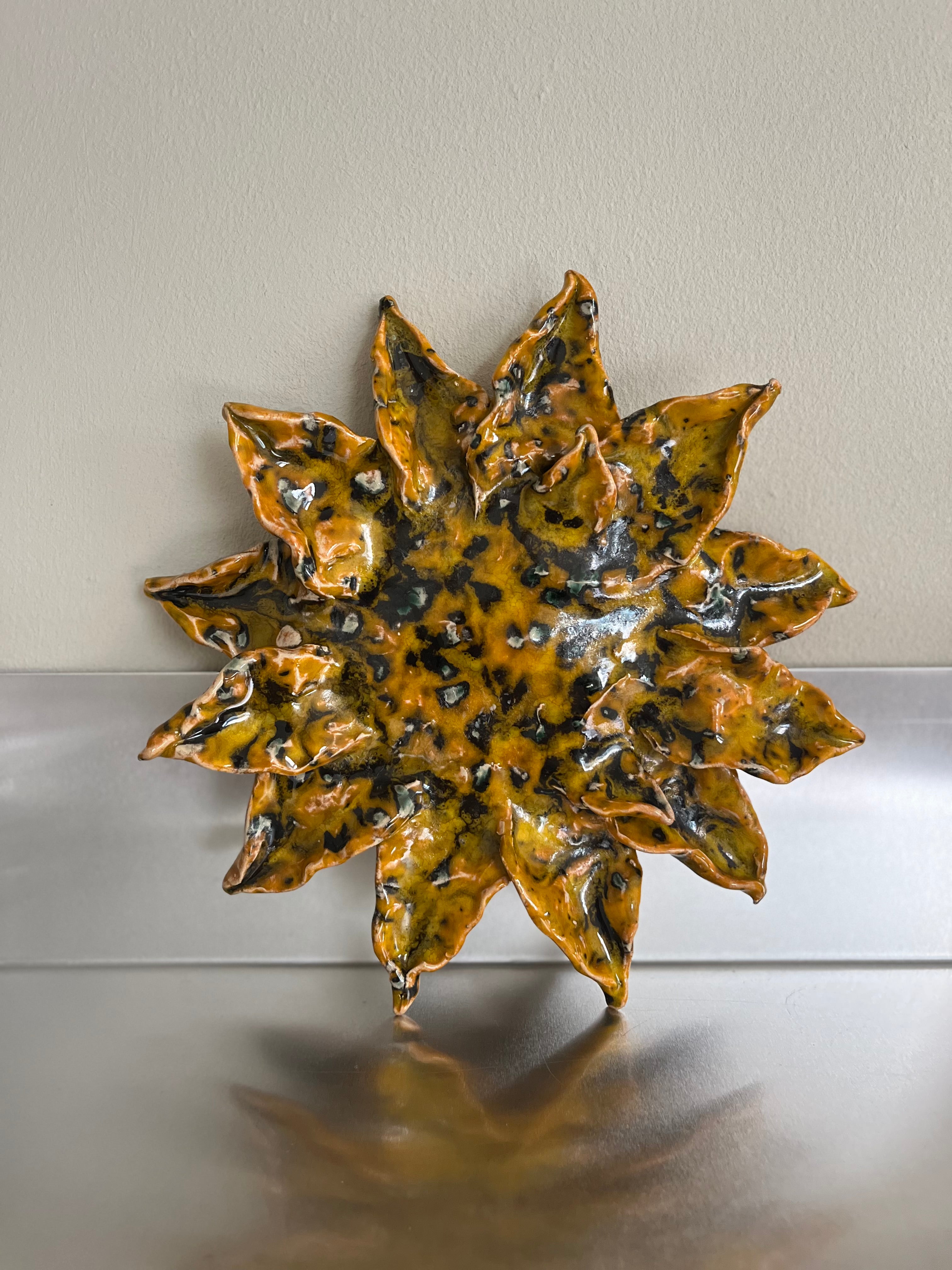 Handmade sunflower art object by Emilie Holm Atelier, decorative floral piece with bright yellow petals and textured details.