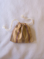 Lille Ottomania snørepose 11 × 10 cm • Beige, rosa, gul og brun