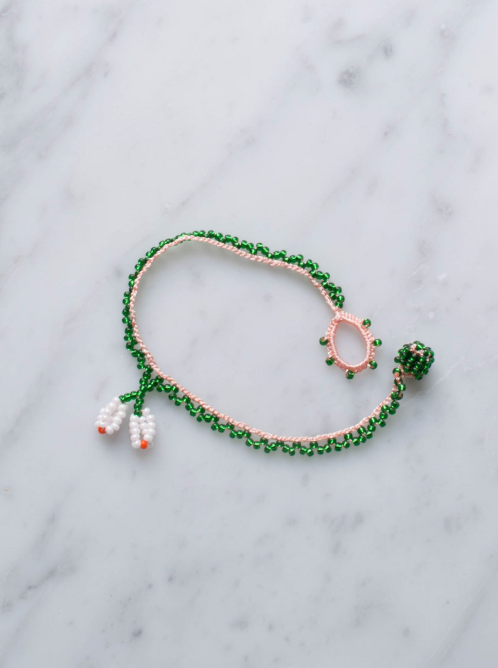 Armbånd • Kniplet • Grøn med hvid blomst