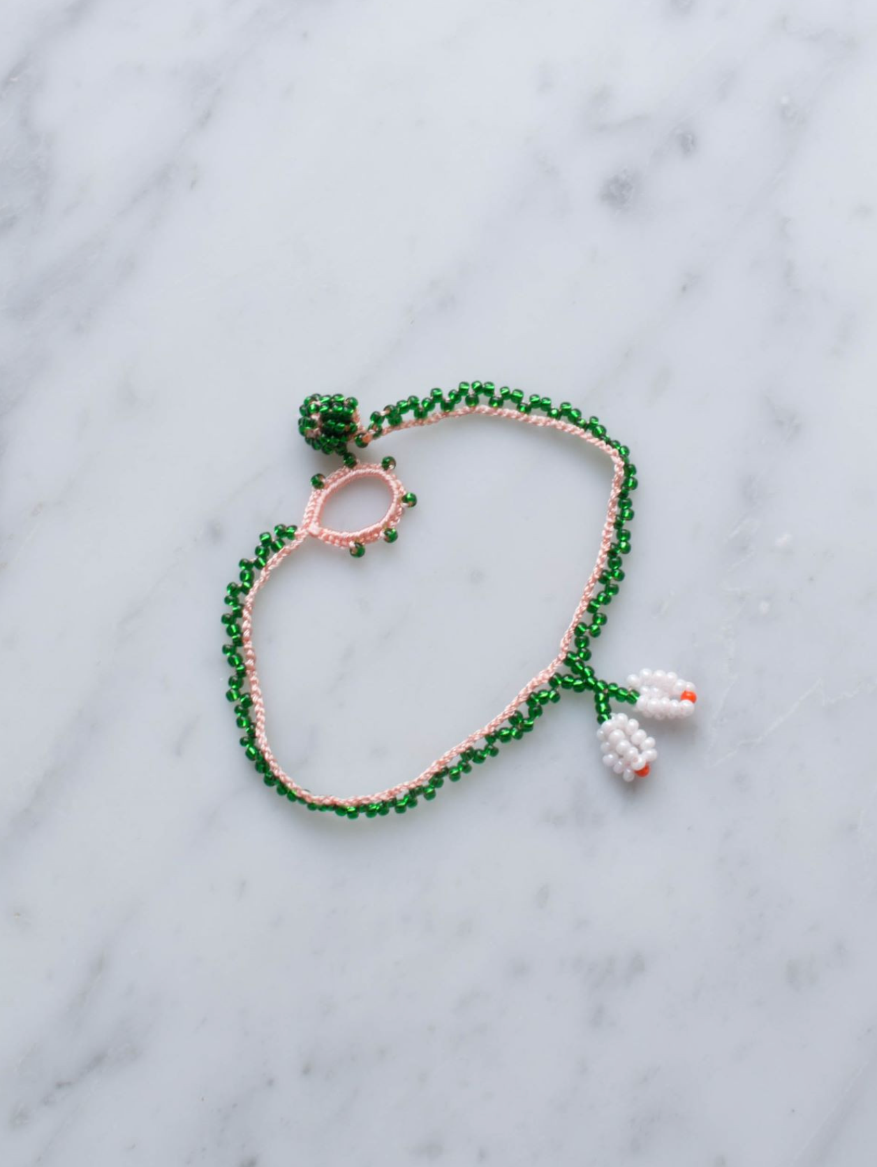 Armbånd • Kniplet • Grøn med hvid blomst