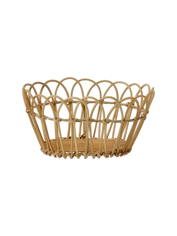 Small rattan bread basket by Bungalow with woven design, perfect for serving bread or pastries.