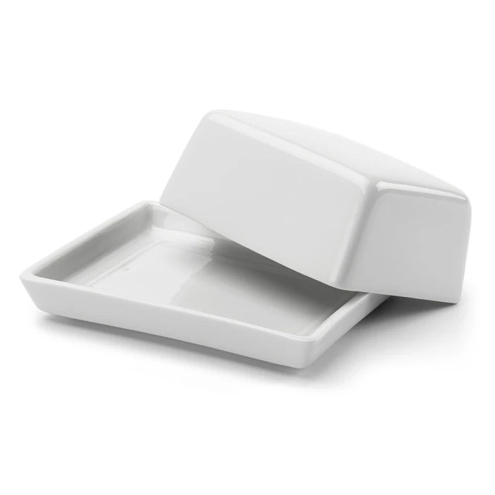 Små smørskål af porcelæn fra DORA, perfekt til smør eller små serveringer, hvidt og elegant design