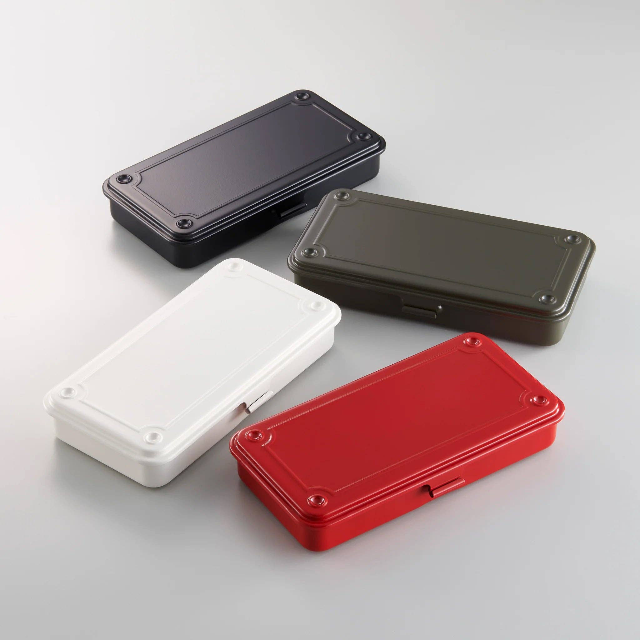 Gray Toyo Steel Co. Ltd storage box with lid, rectangular shape, sturdy metal construction for organized storage.
