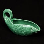 Vintage Kande Fisk Sarreguemines Grøn fade in rich green color with intricate detailing, showcasing its unique design.