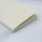 Midori A6 notesbog med blank sider, holdbar omslag og minimalistisk design, ideel til notater og skitser