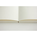 Midori B6 blank notesbook with MD paper, featuring a minimalist design and smooth pages for writing and note-taking.