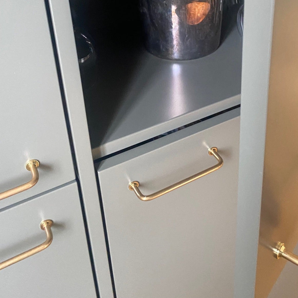 Hanger handle • Brass • 128 mm • Round foot disc