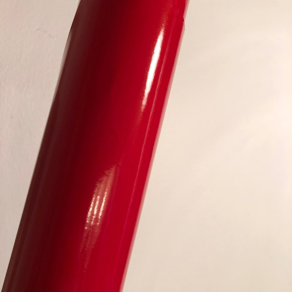 Red DORA gift wrap paper roll, 3 meters long, showcasing vibrant red design suitable for gift wrapping.